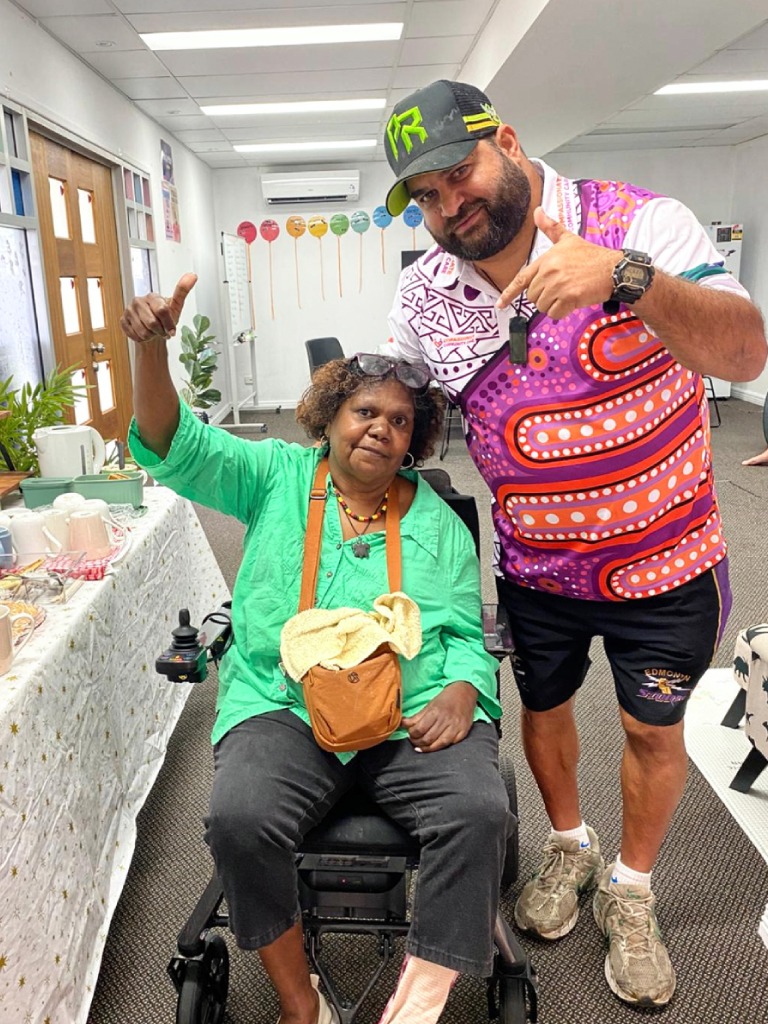 Healthcare professional supporting an adult client